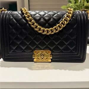 CHANEL Black Quilted Leather Shoulder Bag with Gold Hardware